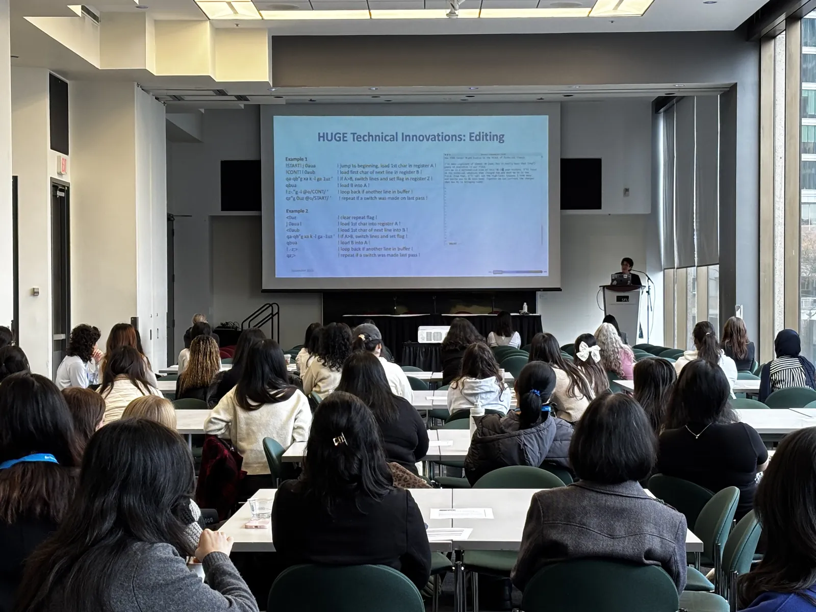 Full audience watching a keynote presentation at CAN-CWiC West 2025